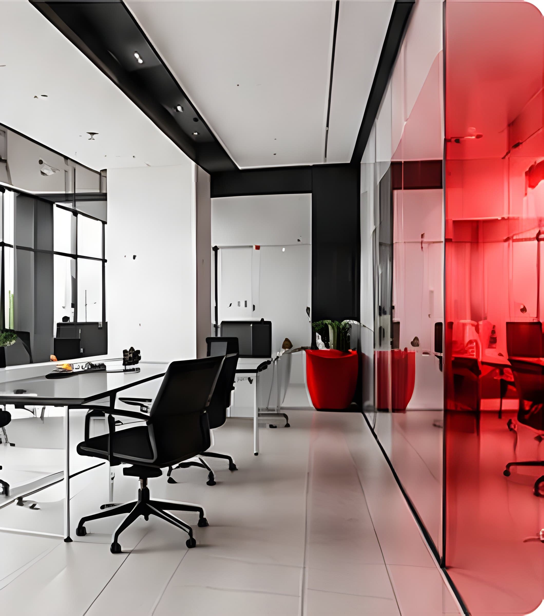 Bright modern office interior with glass walls and red accents